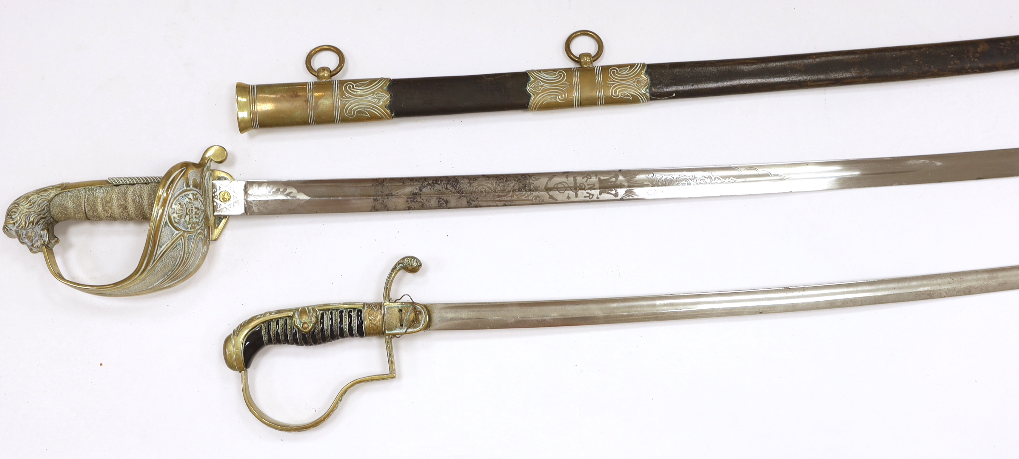 Victorian Royal Naval Reserves dress sword in brass and leather scabbard, blade 79.7cm and one other dress sword